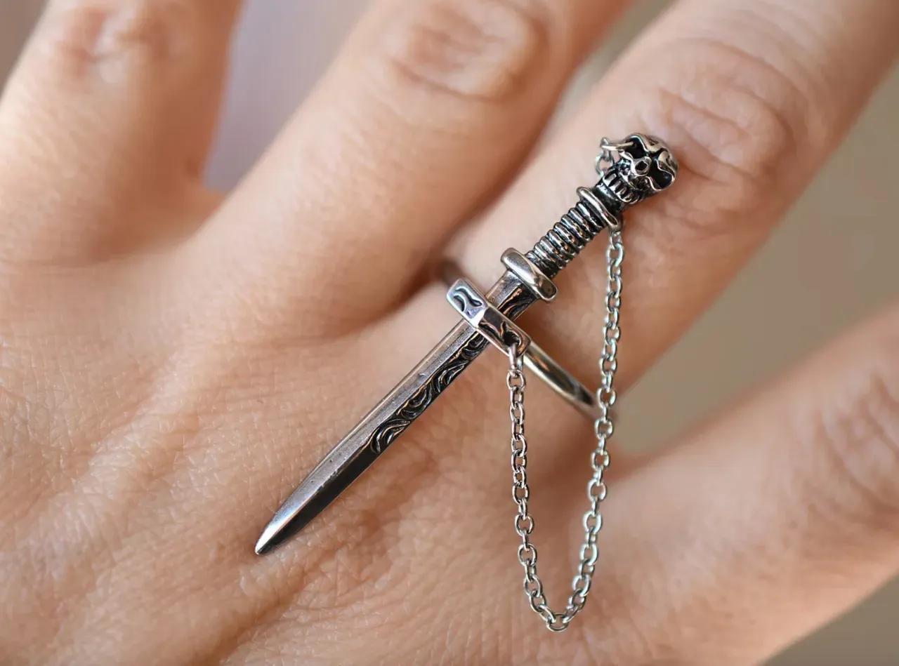 accessory ring with a sword inside